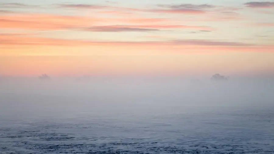 Céu rosa sobre o mar, fotografia de Kelly Sikkema